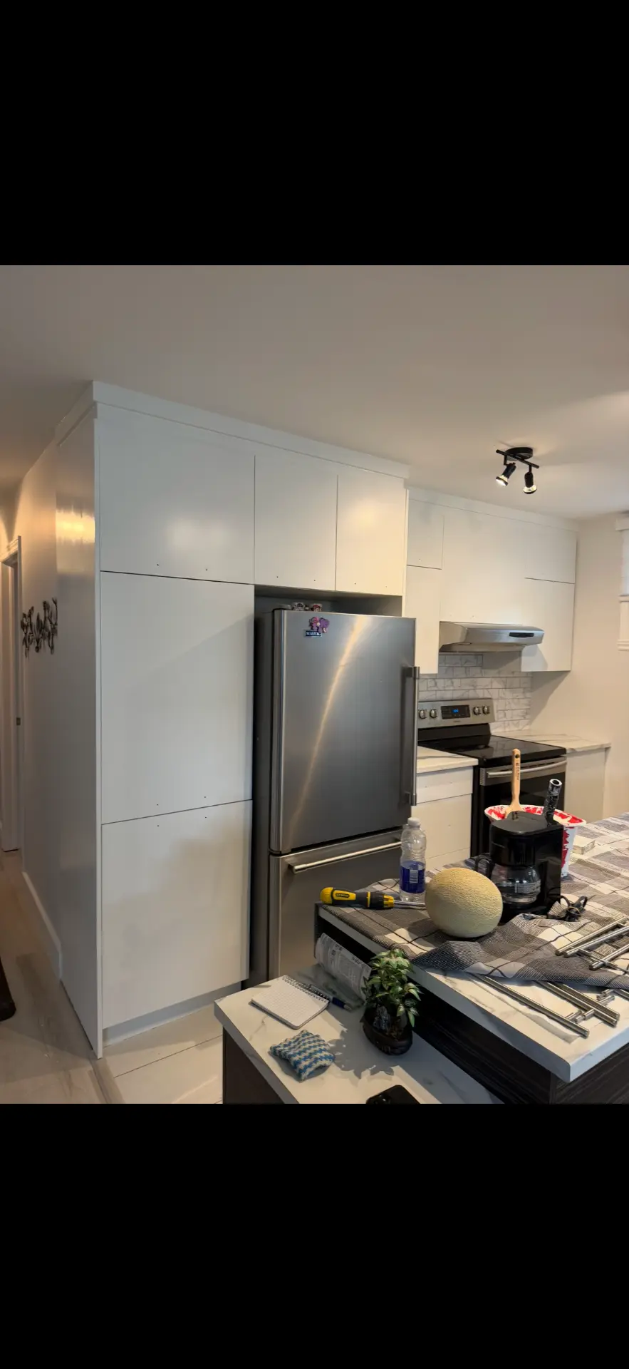 Réalisation terminée — Peinture d'armoires de cuisine